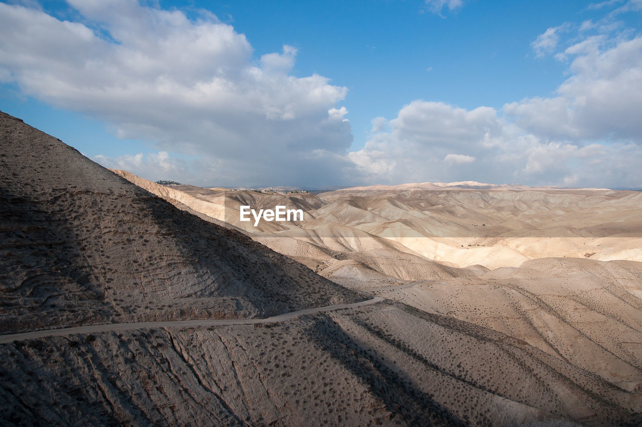 Aerial view of desert against sky