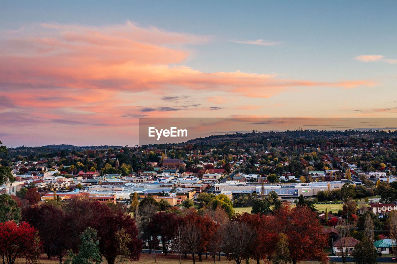 High angle view of townscape against sky at sunset
