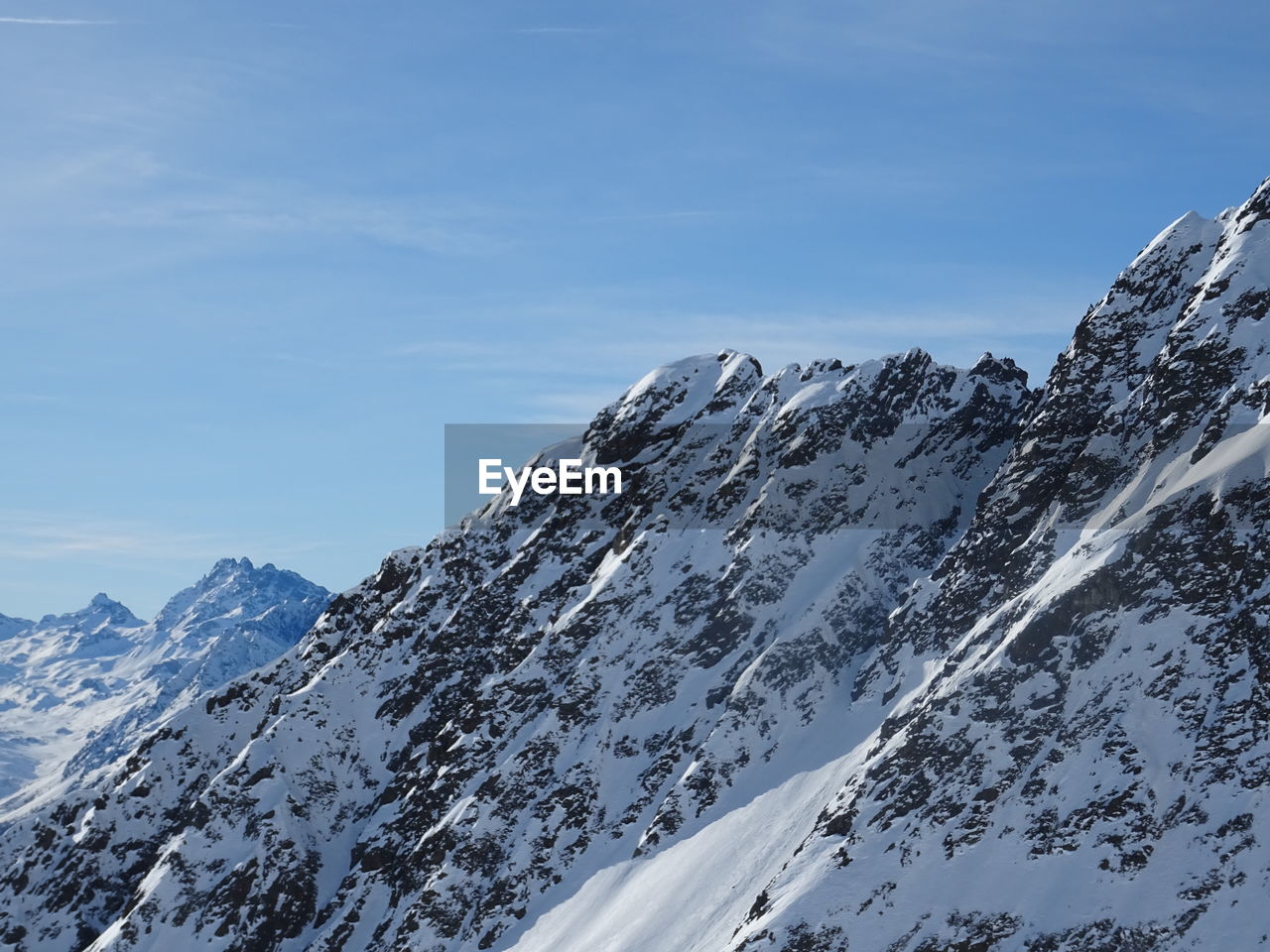 SNOWCAPPED MOUNTAIN AGAINST SKY