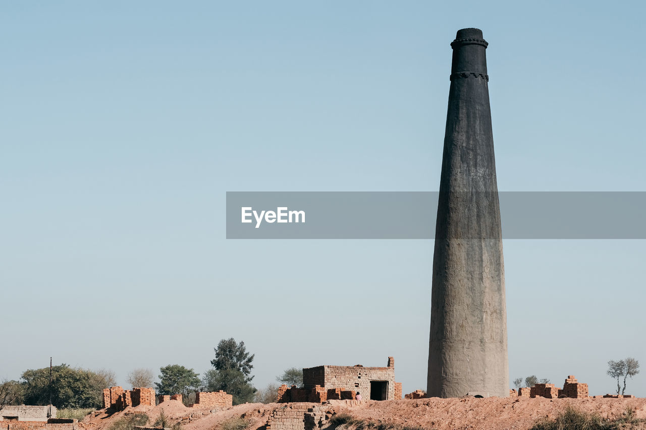 Chimney against clear sky