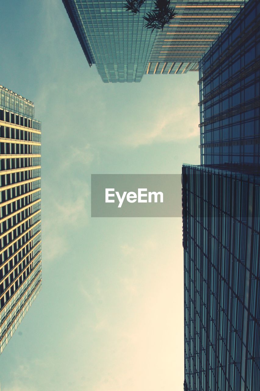 Low angle view of modern buildings against sky