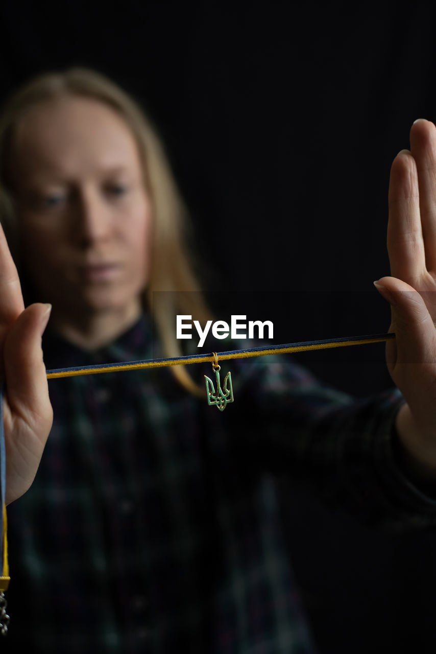 Ukrainian woman with the national emblem trident