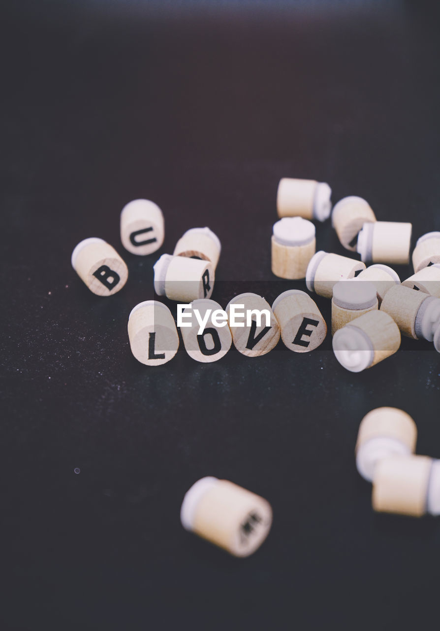 Close-up of pills on black background