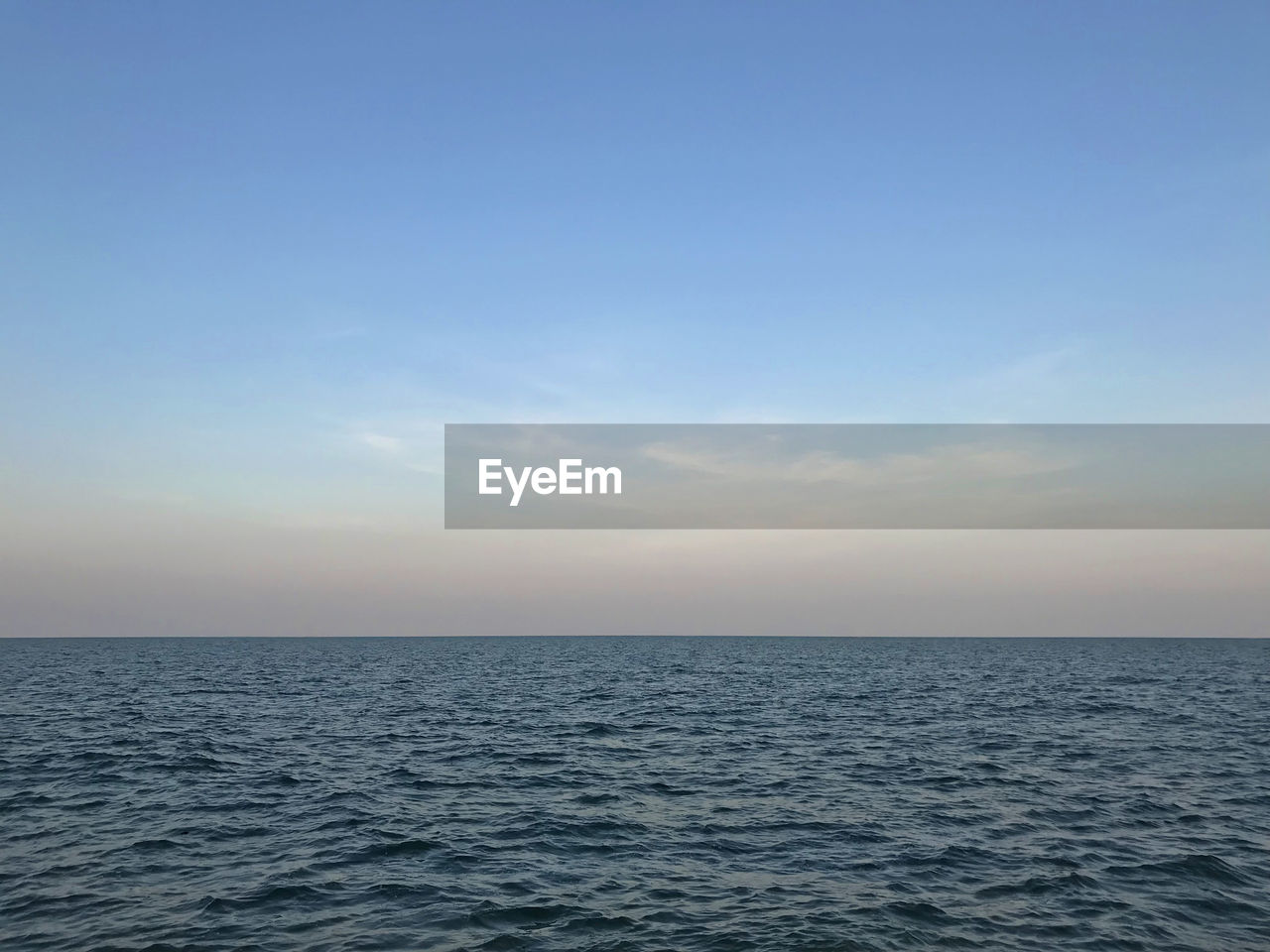 SCENIC VIEW OF SEA AGAINST BLUE SKY