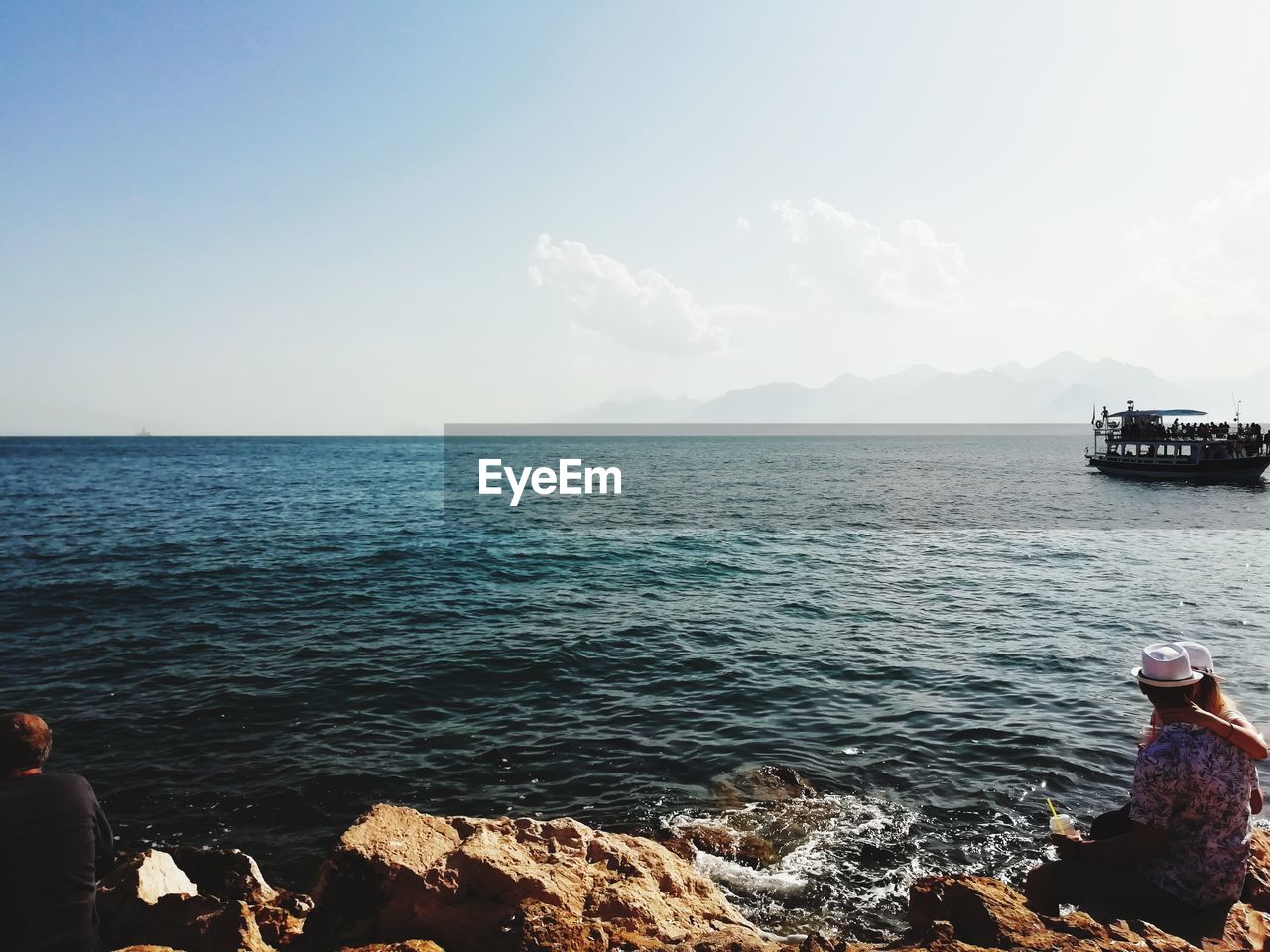 PANORAMIC VIEW OF ROCKS IN SEA AGAINST SKY