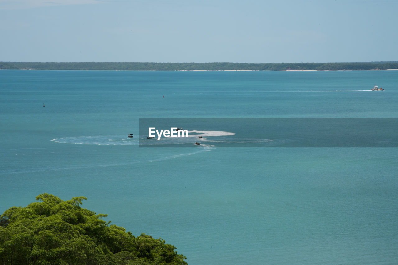 Scenic view of sea against clear sky