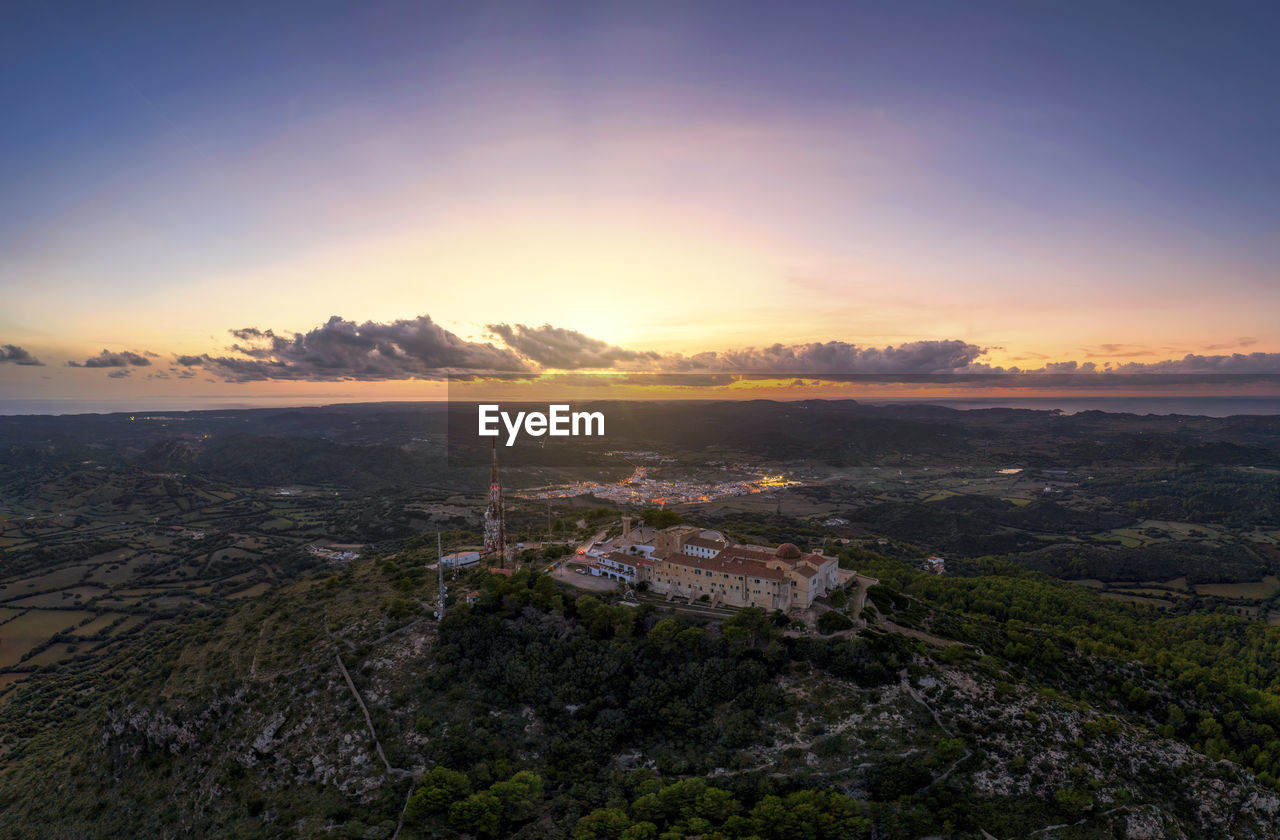 Spain, balearic islands, menorca, aerial view of sanctuary of verge del toro at sunset