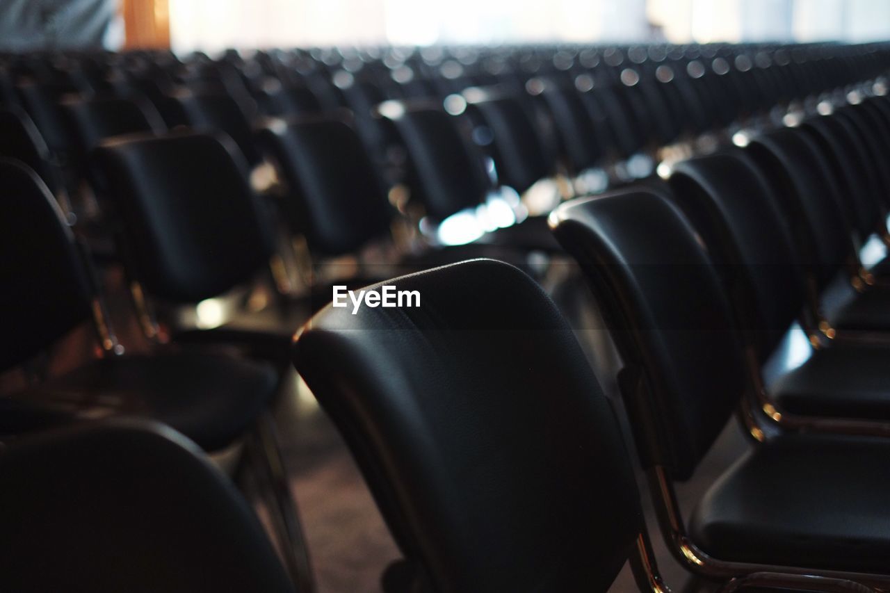 Empty chairs in auditorium