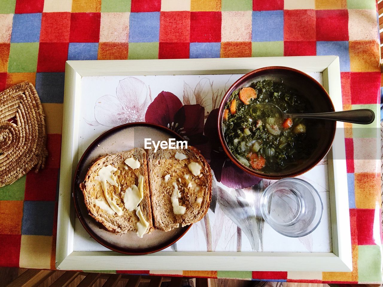 Directly above shot of homemade vegetable soup and breads in plate