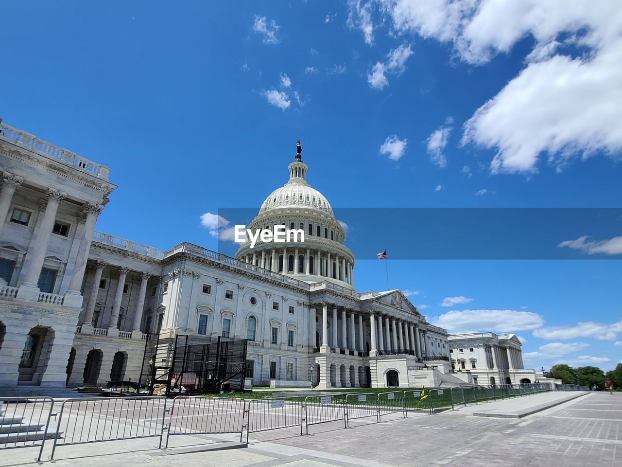 Capitol building against blue sky