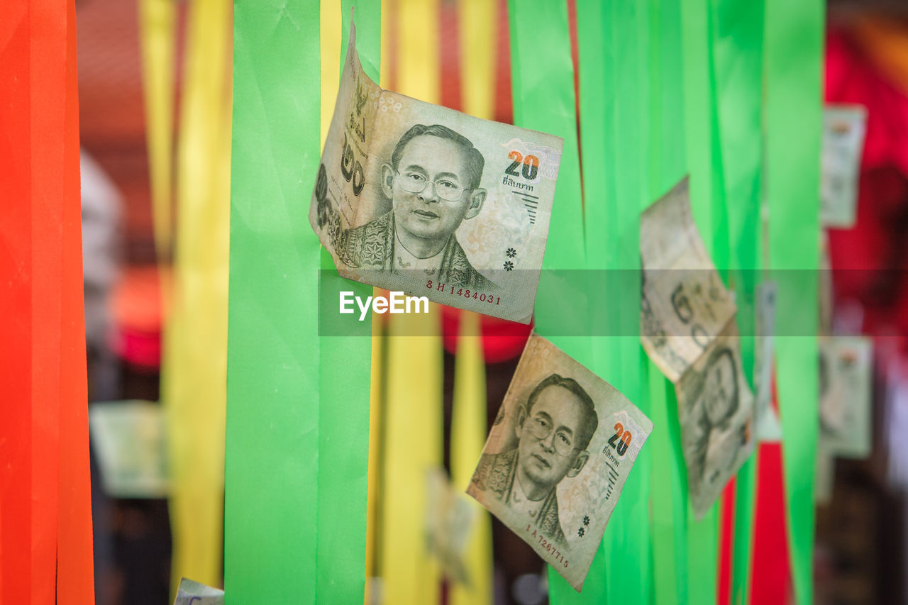 Close-up of paper currency on decor