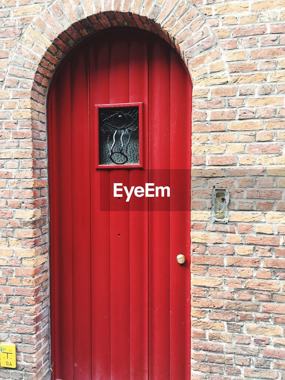 RED CLOSED DOOR OF BUILDING