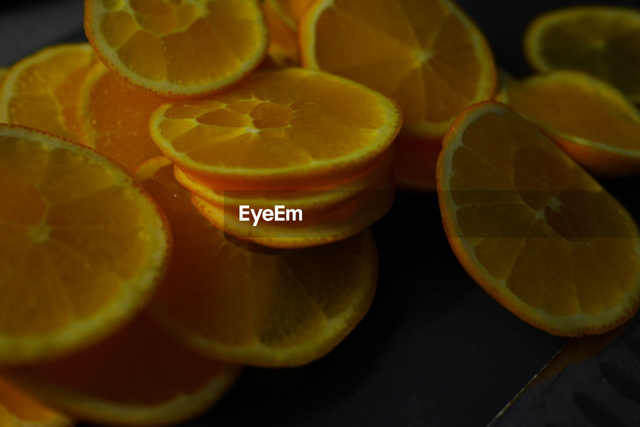 Close-up of oranges on table