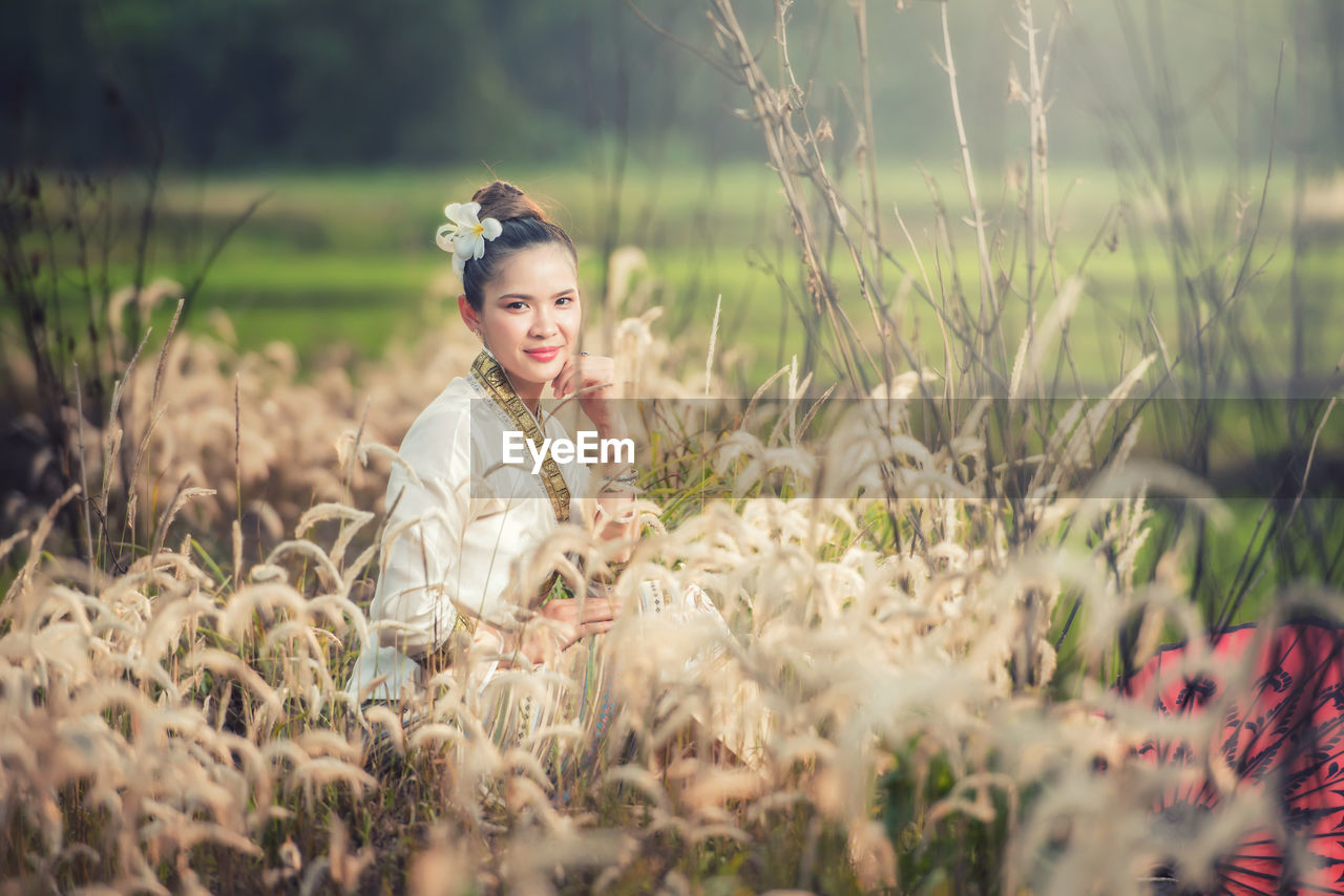 Young woman on field