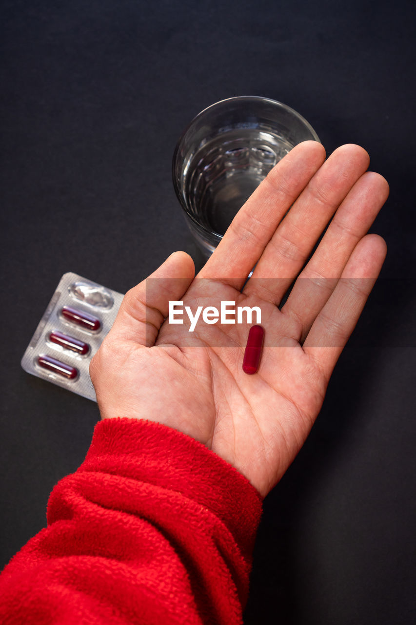 cropped image of man holding drink