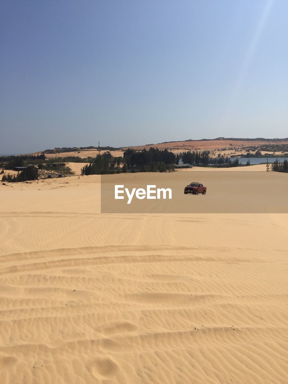 Scenic view of desert against clear sky