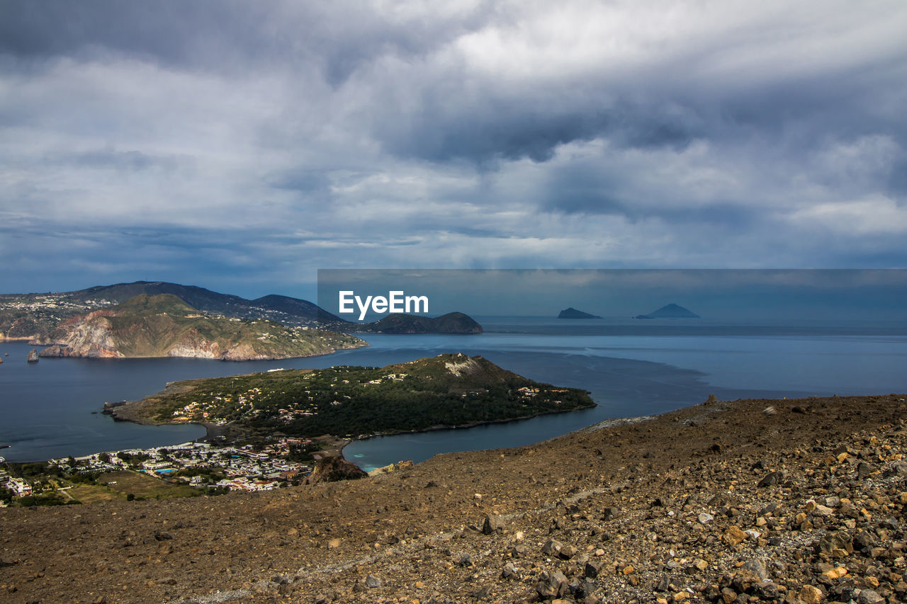 Scenic view of sea against cloudy sky