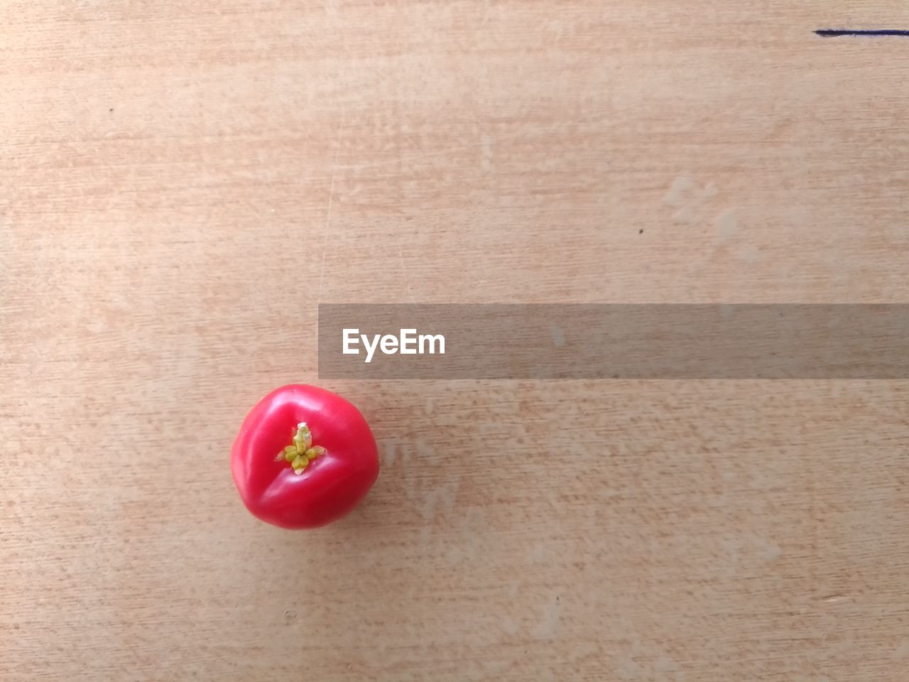 HIGH ANGLE VIEW OF RED HEART SHAPED ON TABLE