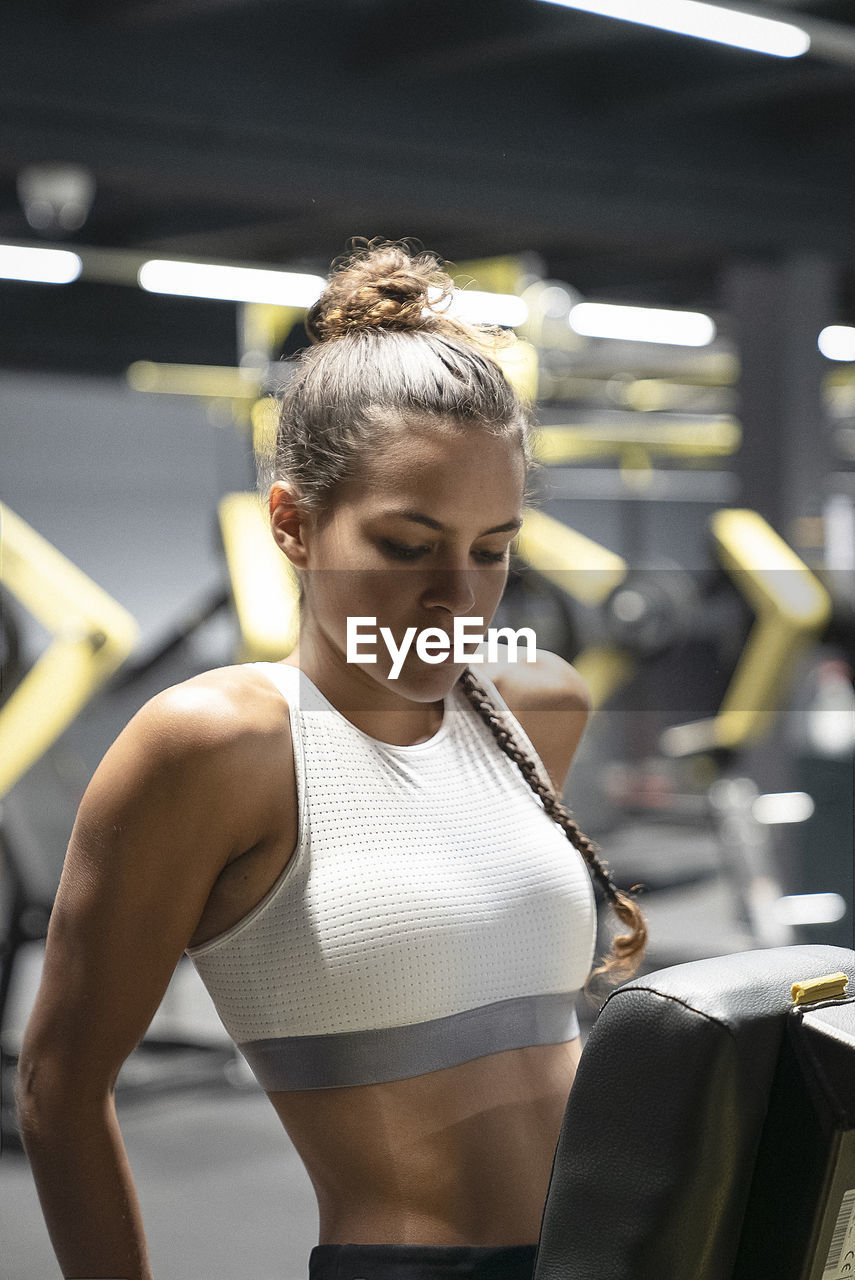 Female athlete exercising in gym