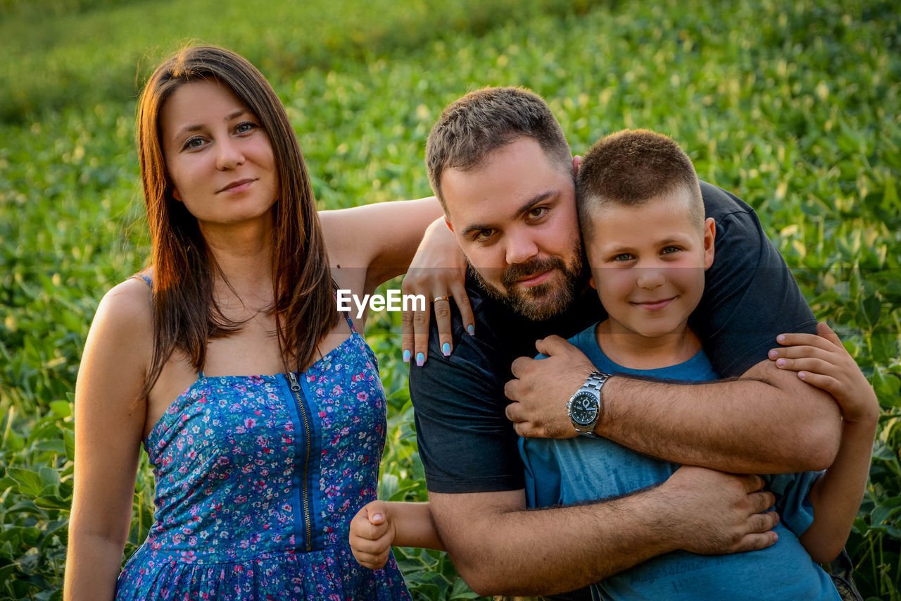 Portrait of happy family at farm