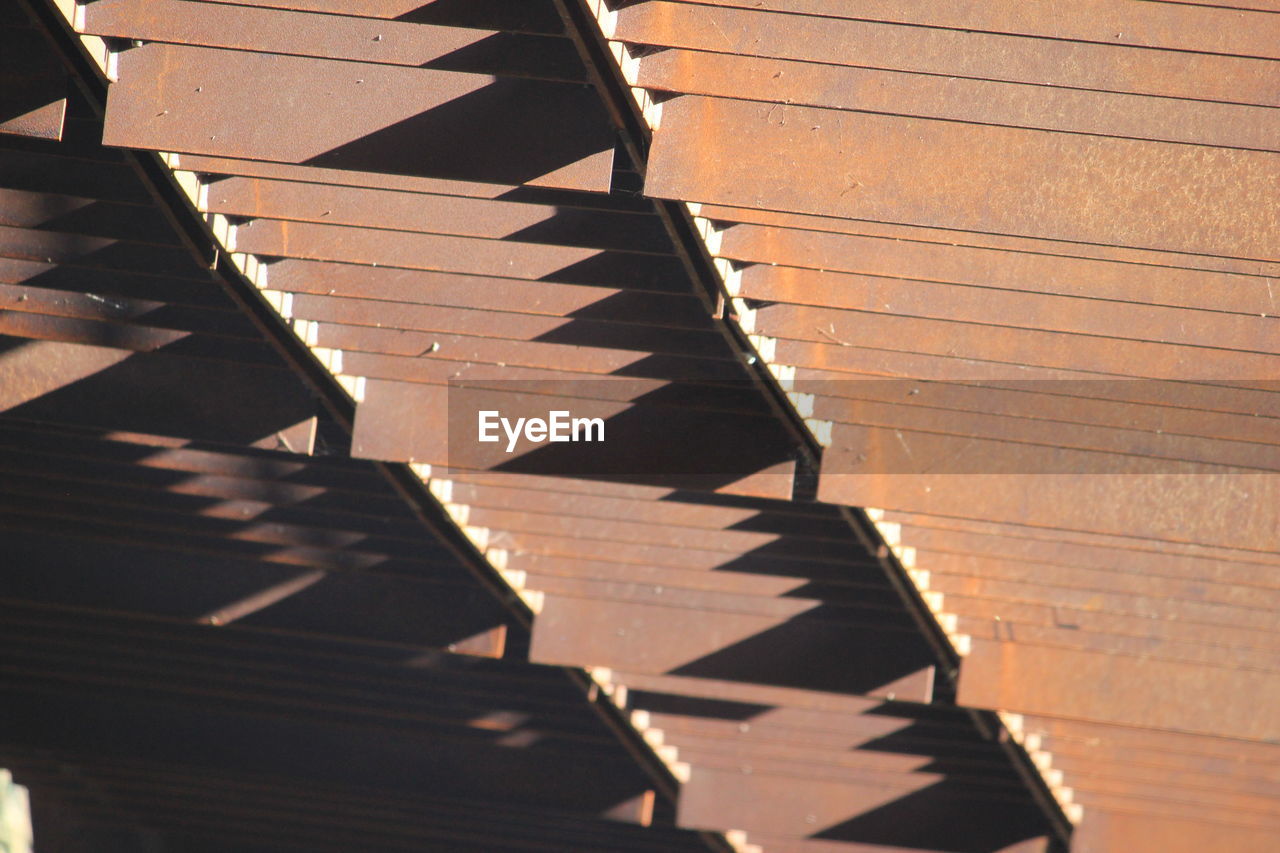 Close-up of shadow on beams