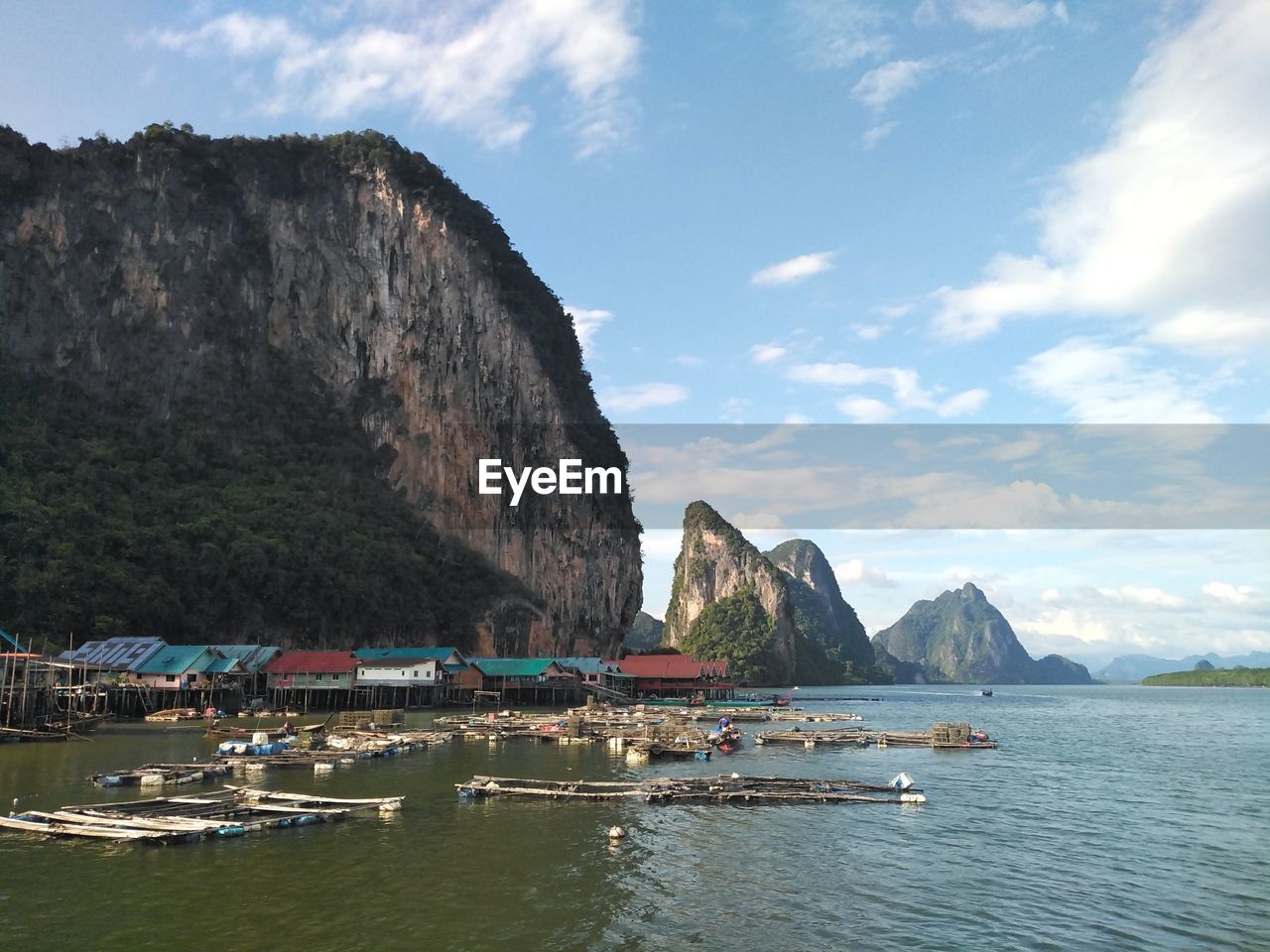 SCENIC VIEW OF SEA AND ROCKS AGAINST SKY