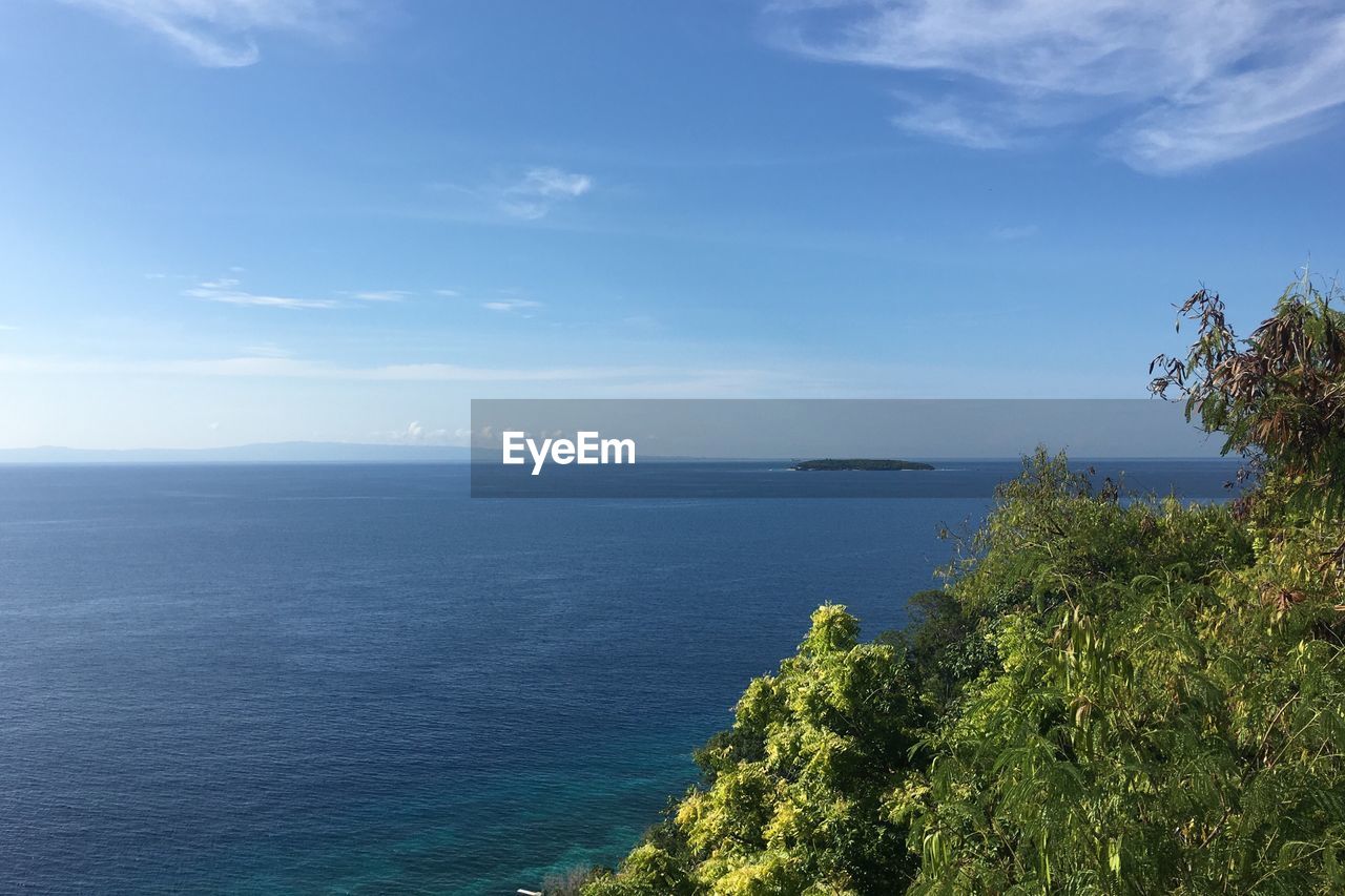 Scenic view of calm sea against sky