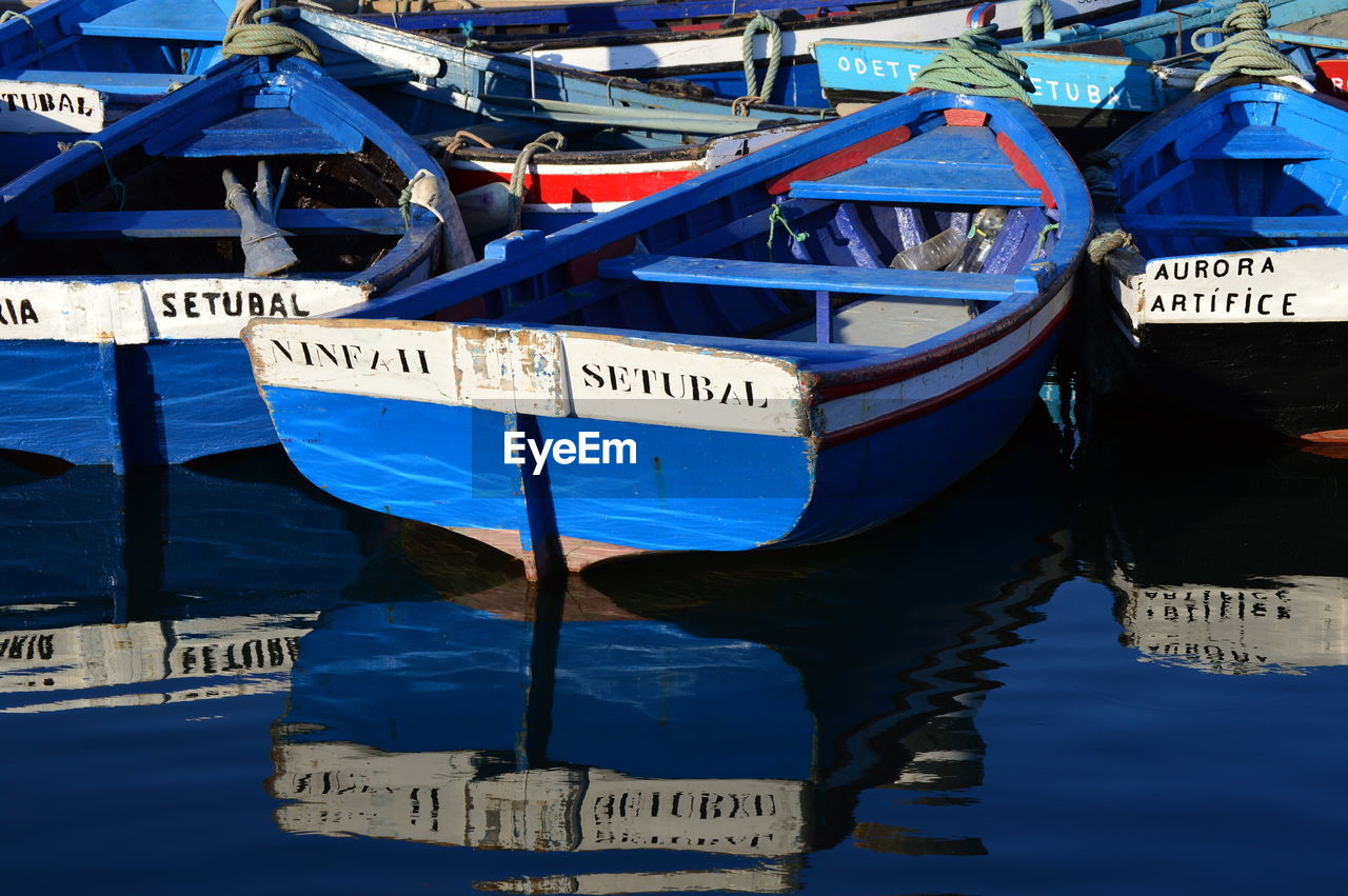 CLOSE-UP OF SHIP MOORED ON WATER