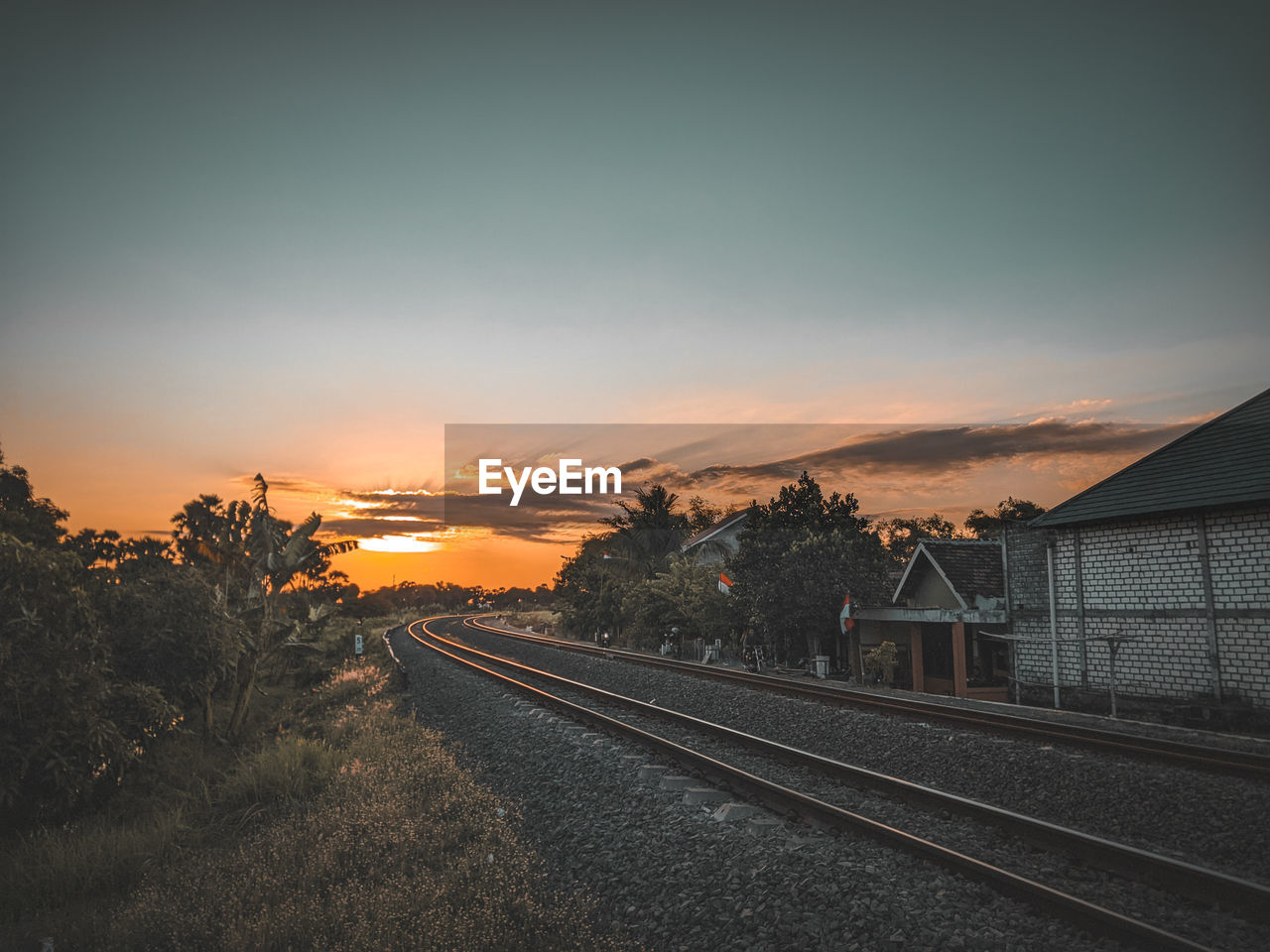 Railroad track at sunset