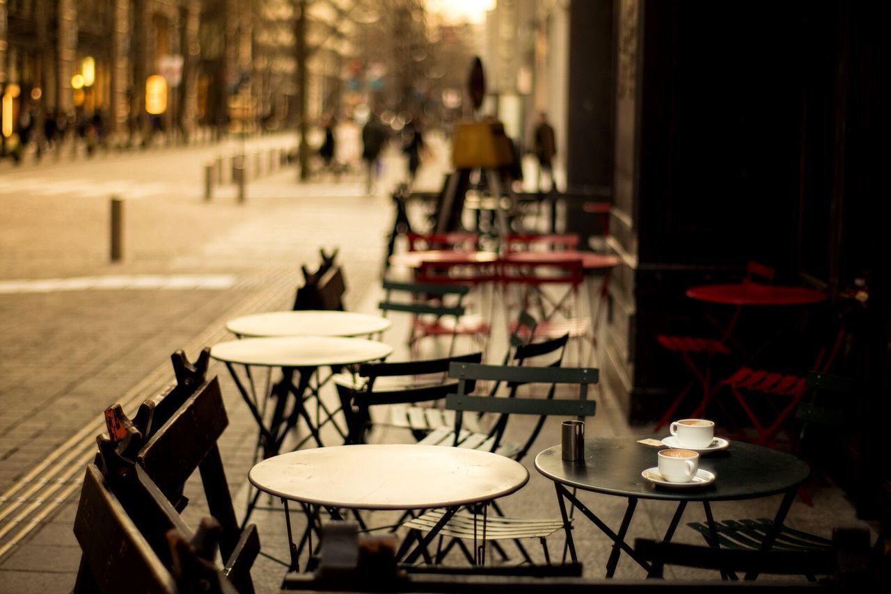 TABLE AND CHAIRS AT SIDEWALK CAFE