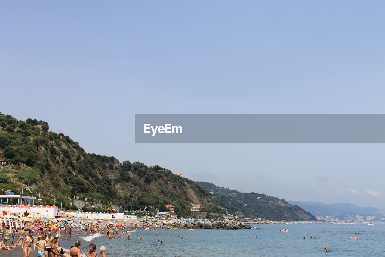 PANORAMIC VIEW OF BEACH AGAINST CLEAR SKY