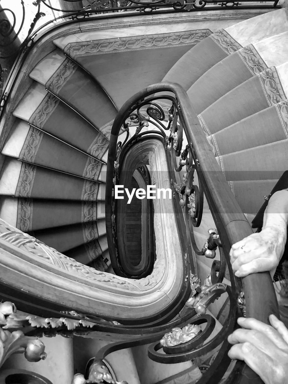 CLOSE-UP OF SPIRAL STAIRCASE OF BUILDING