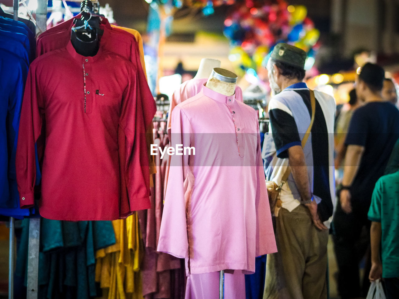 People in market at night