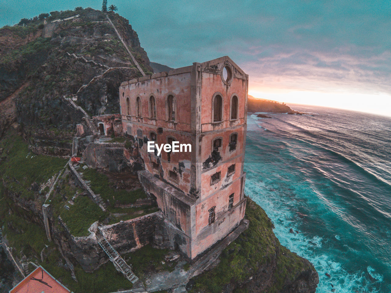 Old ruin building by sea