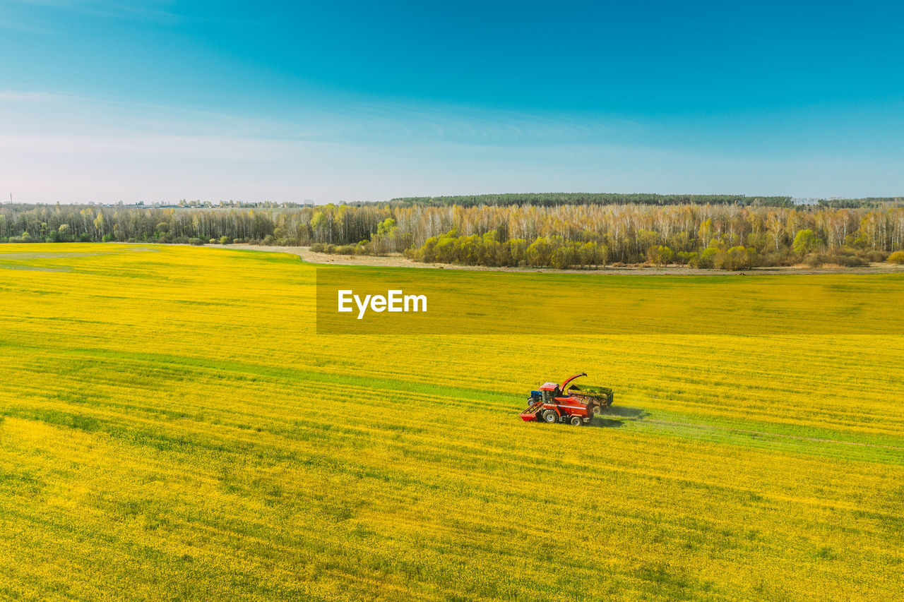 TRACTOR IN AGRICULTURAL FIELD