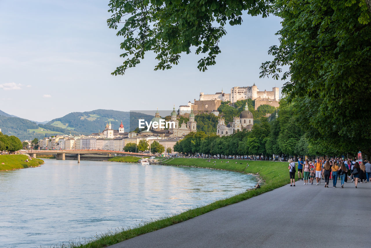 The salzburg skyline with hohensalzburg fortress and salzach river in summer, austria.