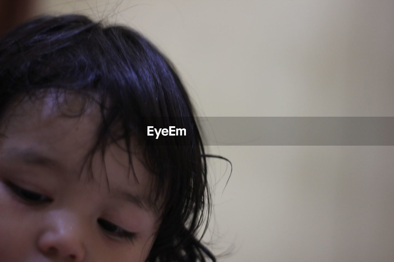 CLOSE-UP PORTRAIT OF CUTE GIRL LOOKING AWAY