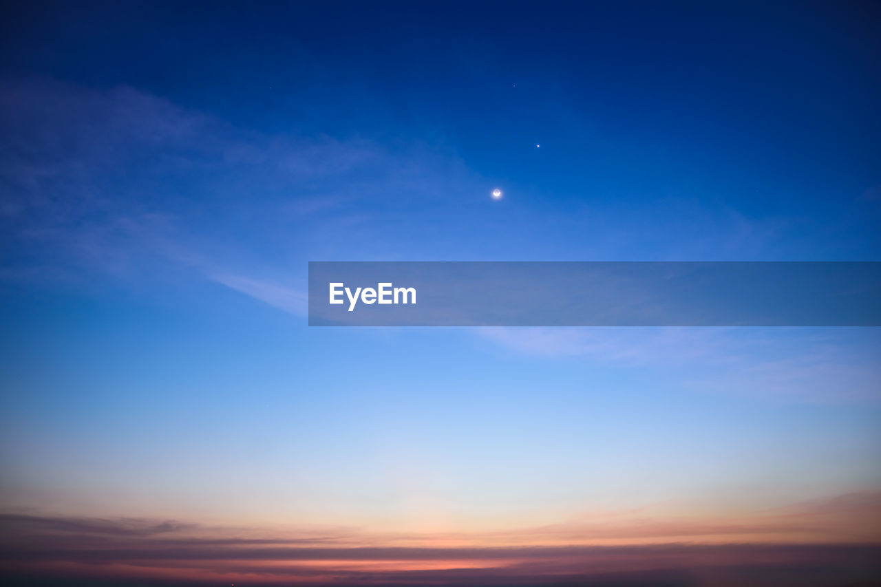 Low angle view of moon in sky