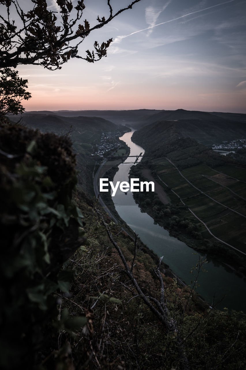 High angle view of river against sky during sunset