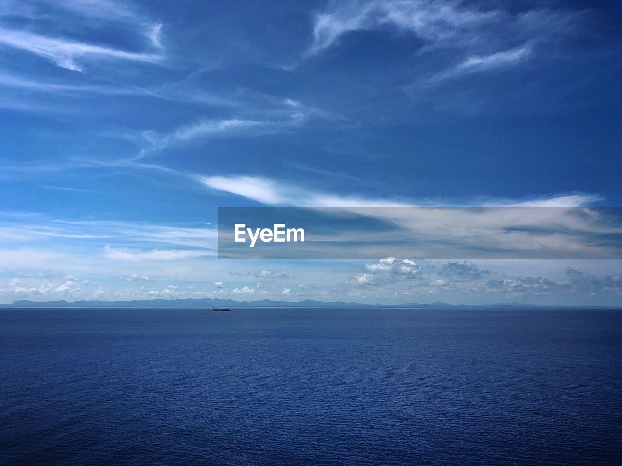SCENIC VIEW OF SEASCAPE AGAINST SKY