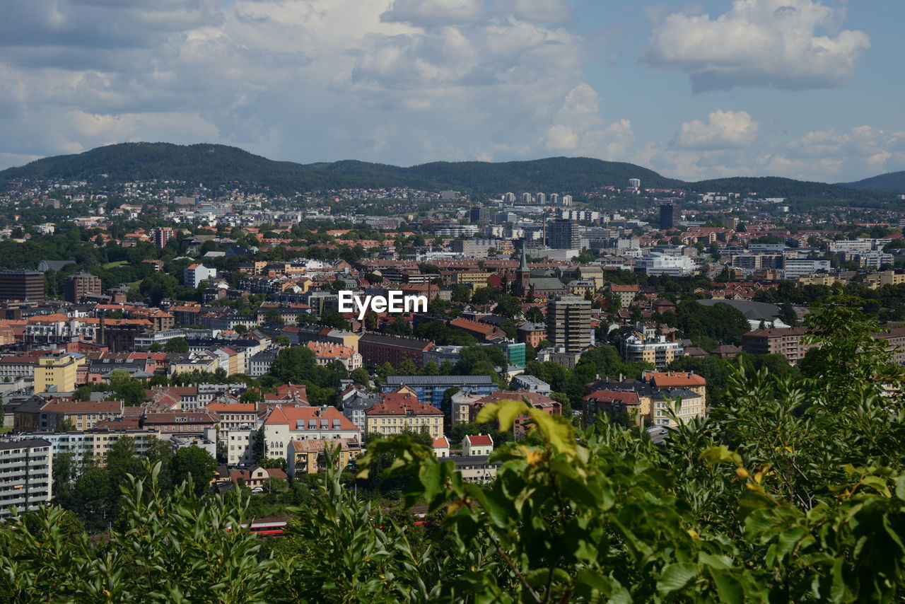 High angle shot of townscape against sky