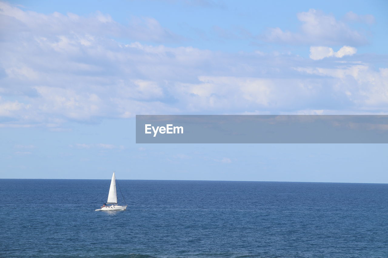 sea, water, sailboat, nautical vessel, sky, sailing, horizon over water, horizon, transportation, cloud, mode of transportation, beauty in nature, ship, scenics - nature, vehicle, ocean, nature, sailing ship, travel, tranquil scene, tranquility, boat, day, yacht, no people, blue, idyllic, outdoors, yachting, luxury, watercraft, holiday, waterfront, bay, coast, vacation, non-urban scene, cruise