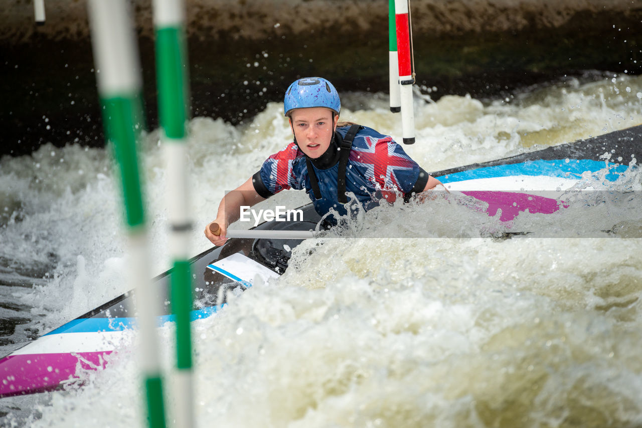 Woman kayaking at river
