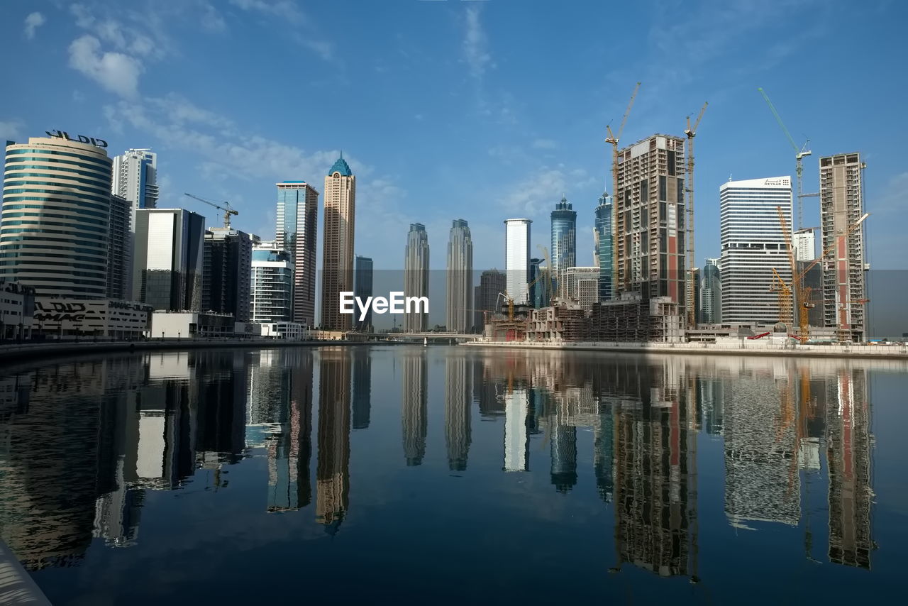 reflection of buildings in city