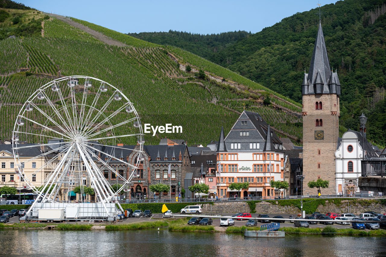 Bernkastel kues riverside with tower and ferris wheel