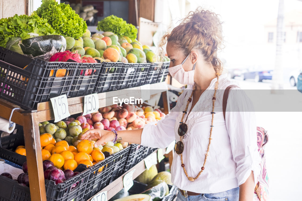 Woman shopping groceries in super market
