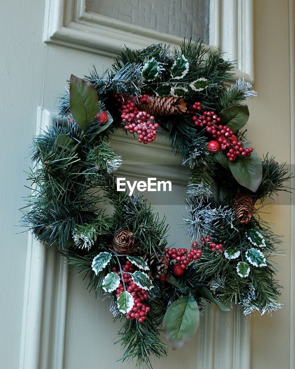 CLOSE-UP OF CHRISTMAS DECORATION HANGING ON TREE AT HOME