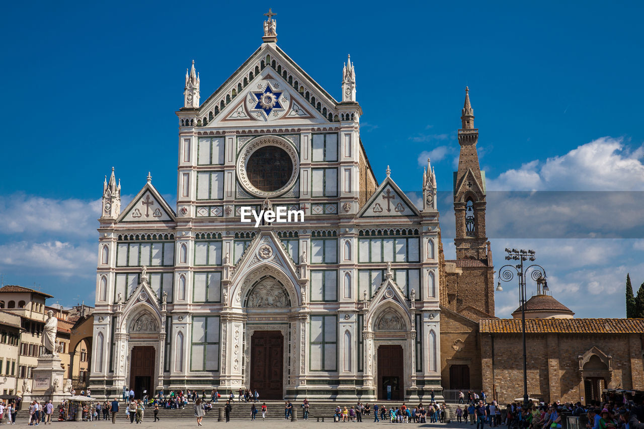 Tourists at the basilica of the holy cross in florence