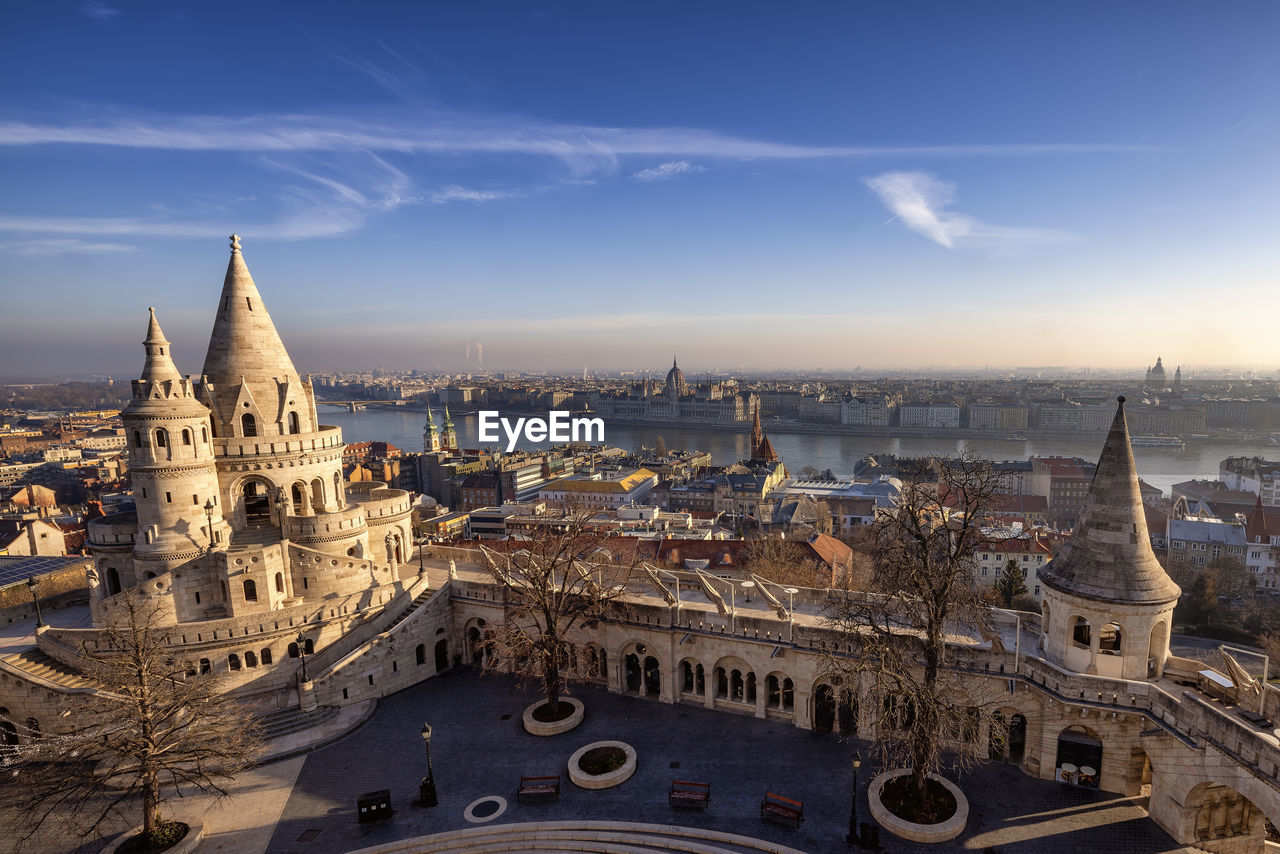 high angle view of buildings in city against sky