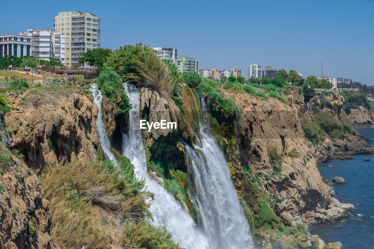 Lower duden waterfalls or lara waterfall in antalya, turkey, on a sunny summer day
